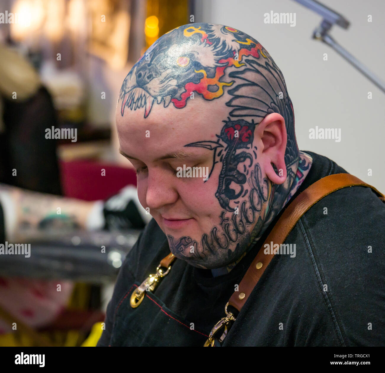 Corn Exchange, Edinburgh, Scotland, UK, 9th Annual Scottish Tattoo  Convention: Enthusiasts and tattoo artists with attendee getting a tattoo  Stock Photo - Alamy