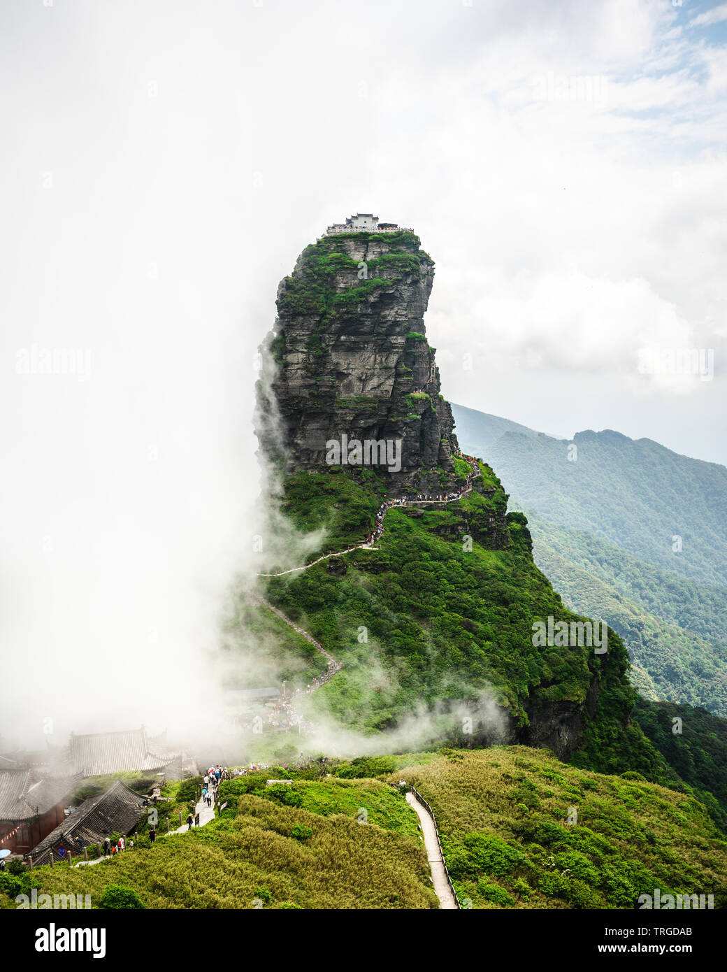 Fanjingshan mountain scenery with view of the red cloud golden peak with Buddhist temple on the top in the clouds in Guizhou China Stock Photo