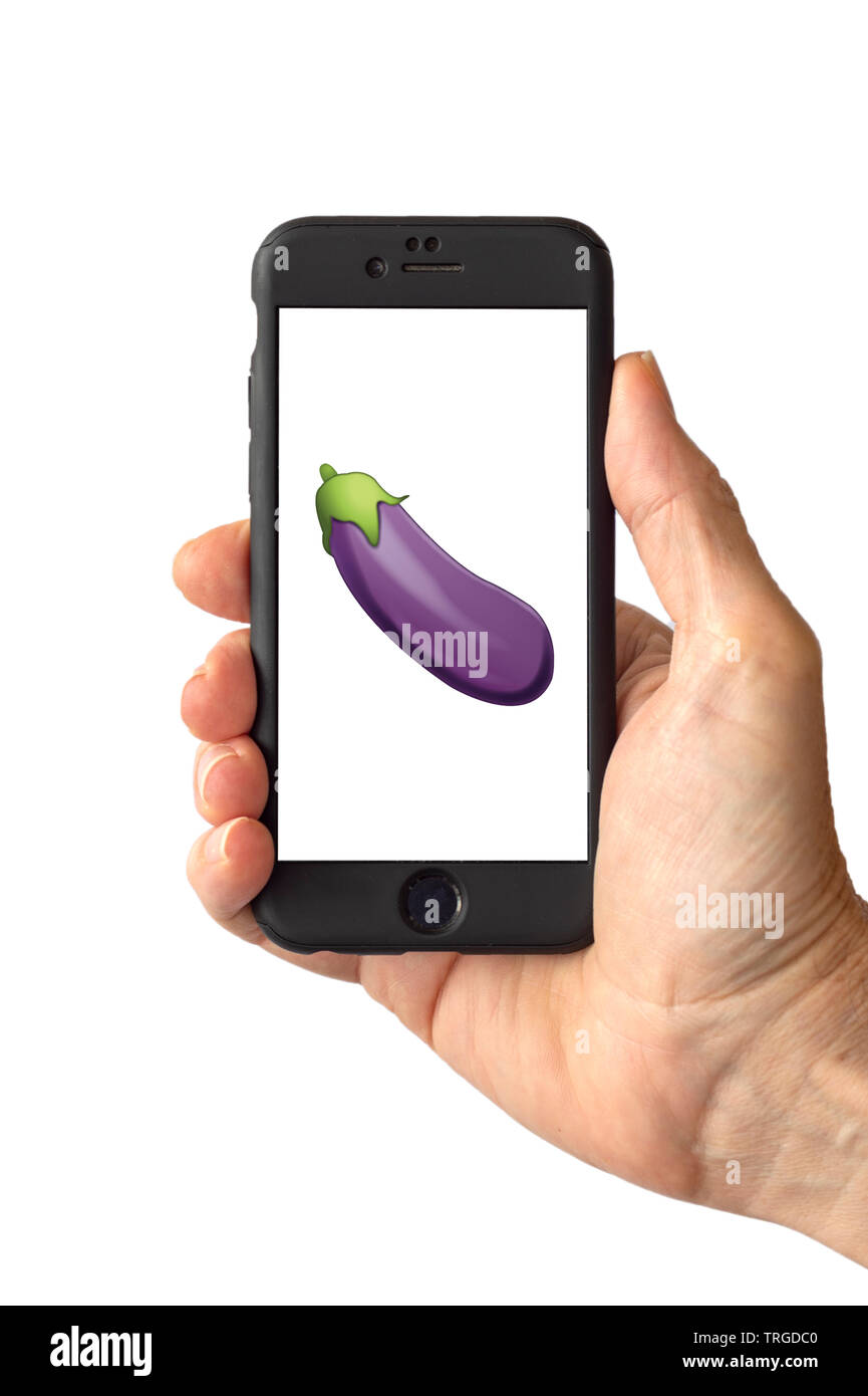 Eggplant Emoji on a smartphone screen Stock Photo