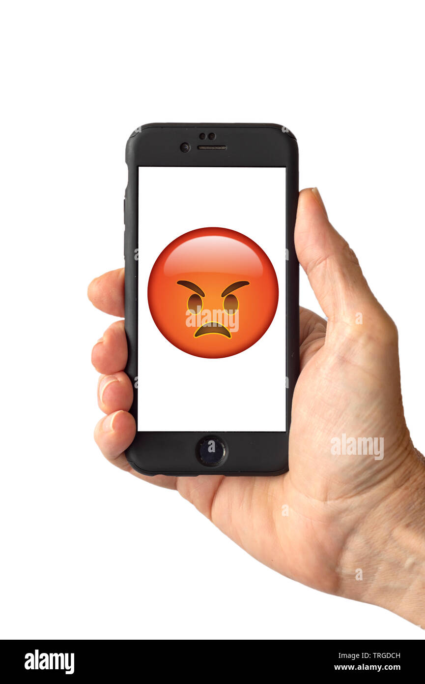 Very Angry Emoji on a smartphone screen Stock Photo