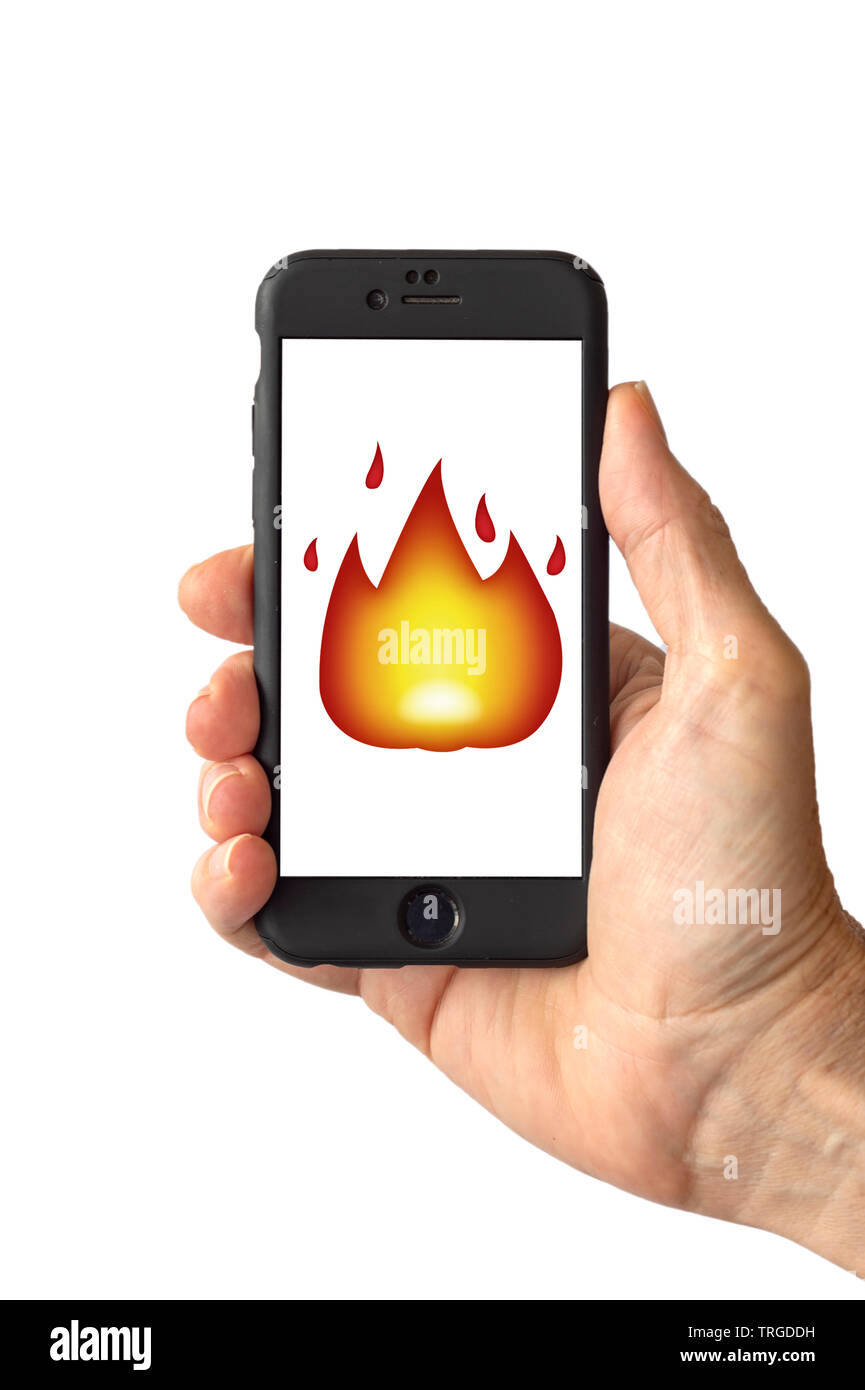 Fire Emoji on a smartphone screen Stock Photo