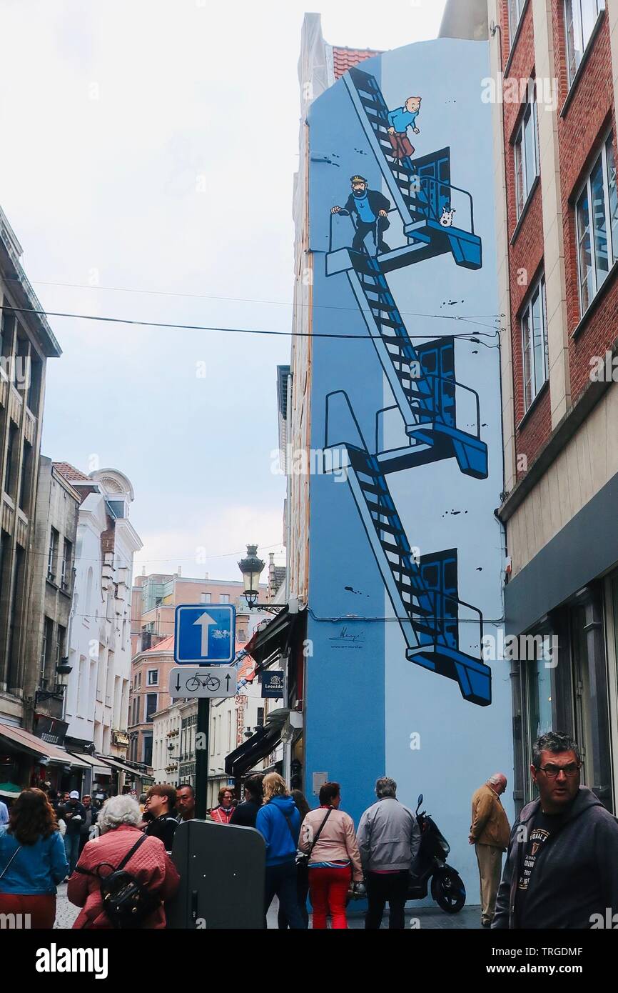 Brussels, Belgium - May 2019: Herge’s Tin Tin, Snowy and Captain Haddock fire escape painting. Rue de L’Etuve, Brussels. Stock Photo