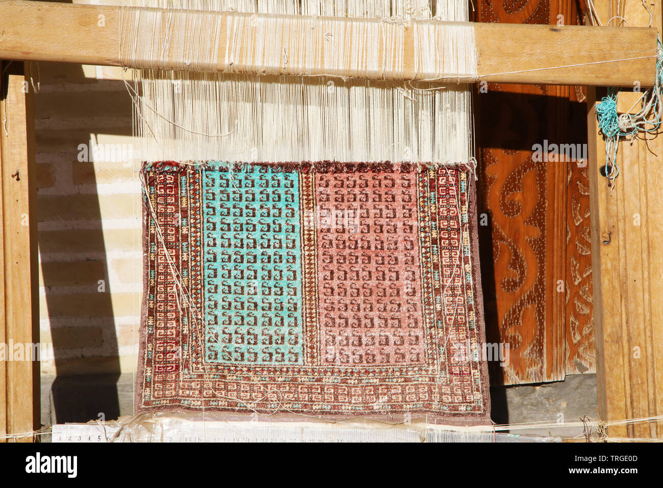 Small loom to weave a carpet in Bukhara, Uzbekistan Stock Photo Alamy