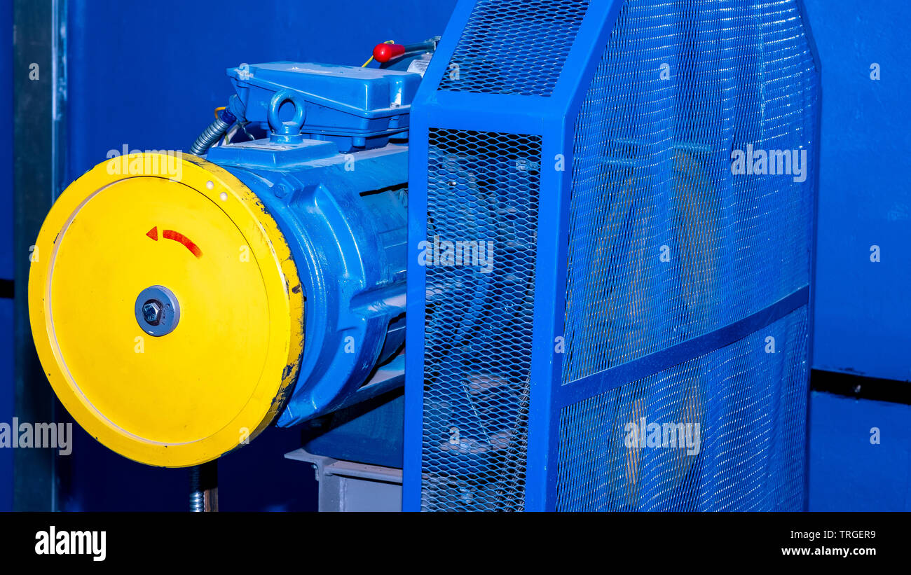 winch with gear and motor Elevator for residential building Stock Photo