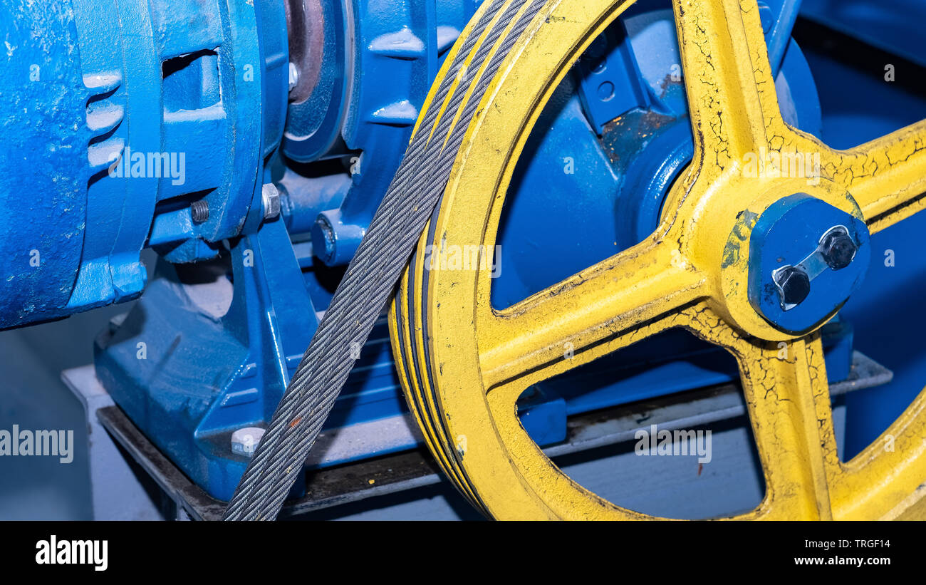 winch with gear and motor Elevator for residential building Stock Photo