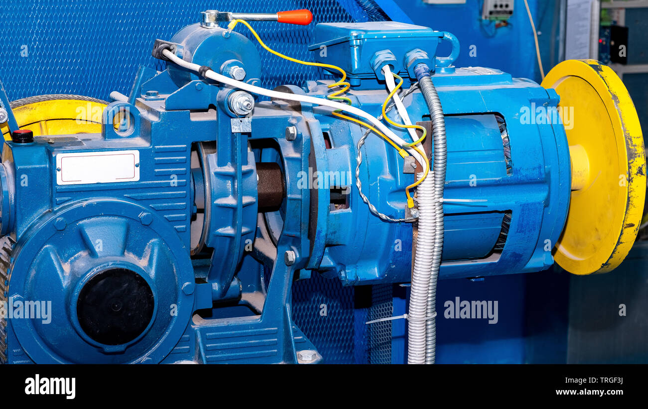 winch with gear and motor Elevator for residential building Stock Photo