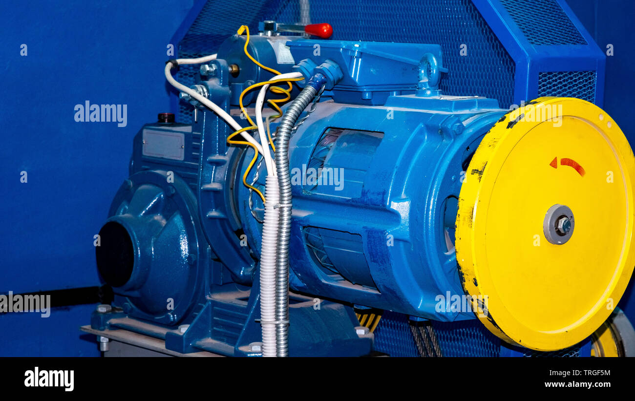 winch with gear and motor Elevator for residential building Stock Photo