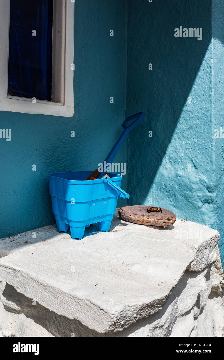 Blue seaside bucket and spade Stock Photo Alamy
