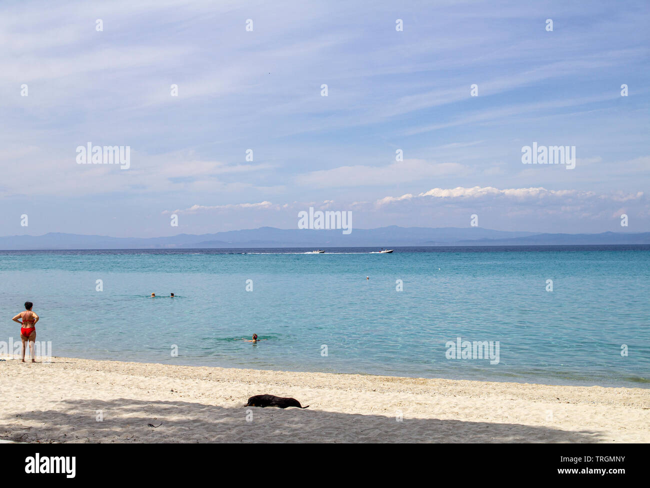 .The beautiful white sandy beach and clear blue water of Chanioti, Halkidiki, greece. Stock Photo