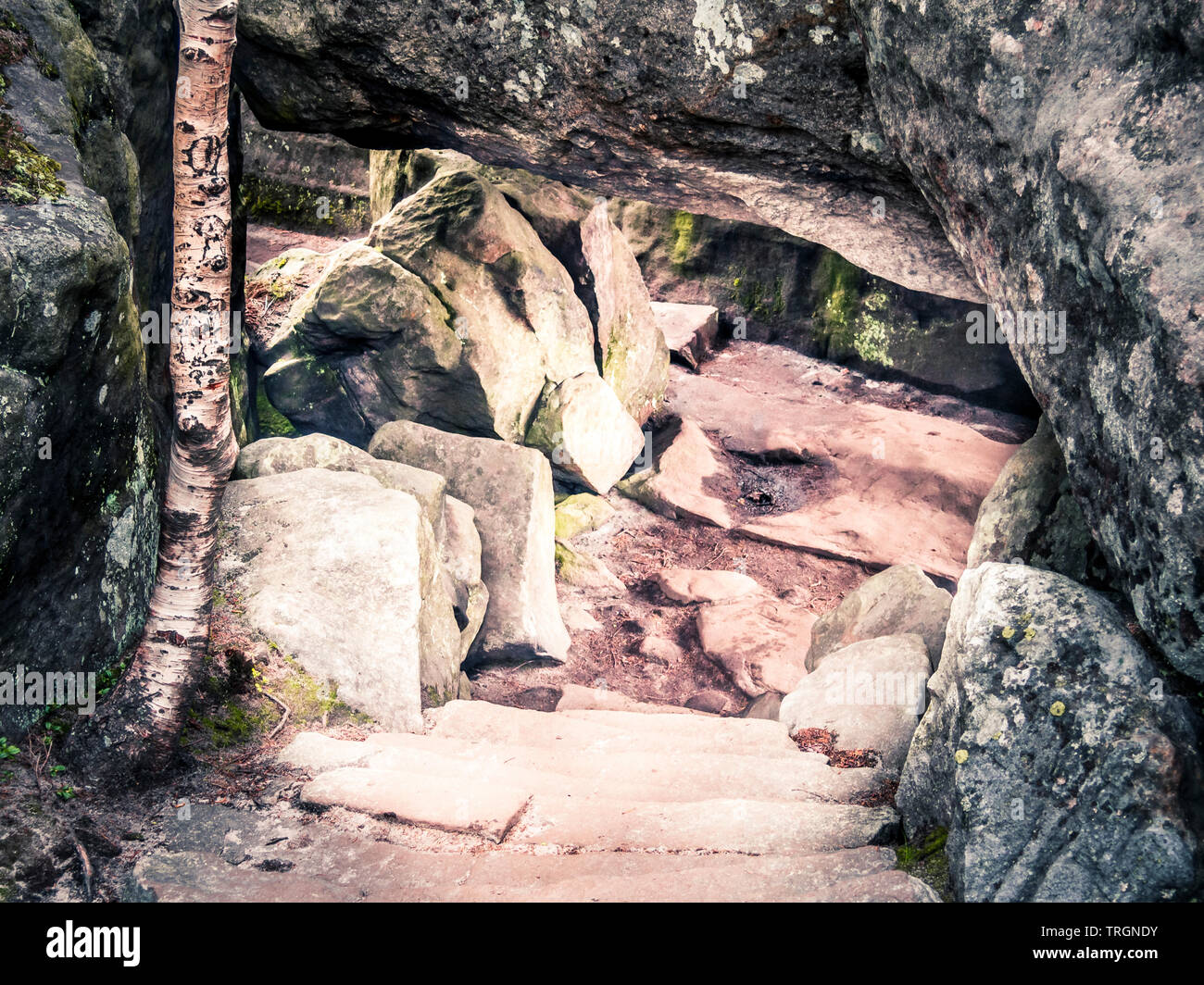 A luminous cave in the Stołowe Mountains Stock Photo