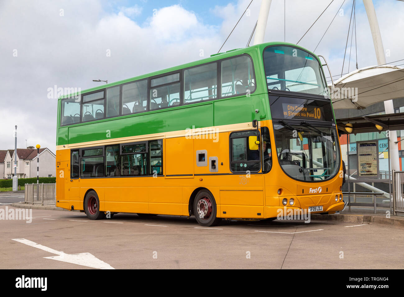 To celebrate 125 years of public transport in Glasgow First Bus have painted a Volvo B9TL bus in the retro Glasgow Corporation orange and green livery Stock Photo