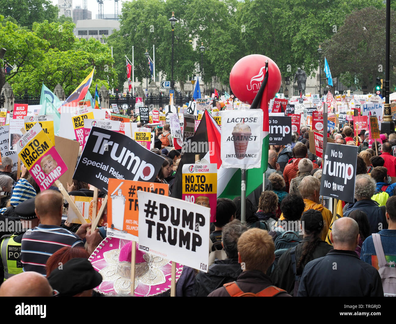 Crowds of people protesting in Parliament Square against the visit of President Donald Trump to London in June 2019 Stock Photo