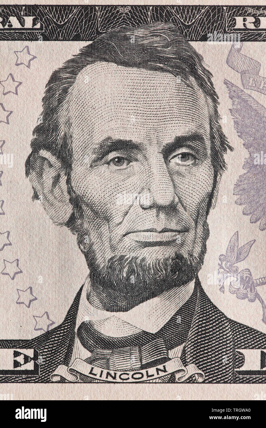 Closeup of Abraham Lincoln on the 5 Dollar Bill Stock Photo