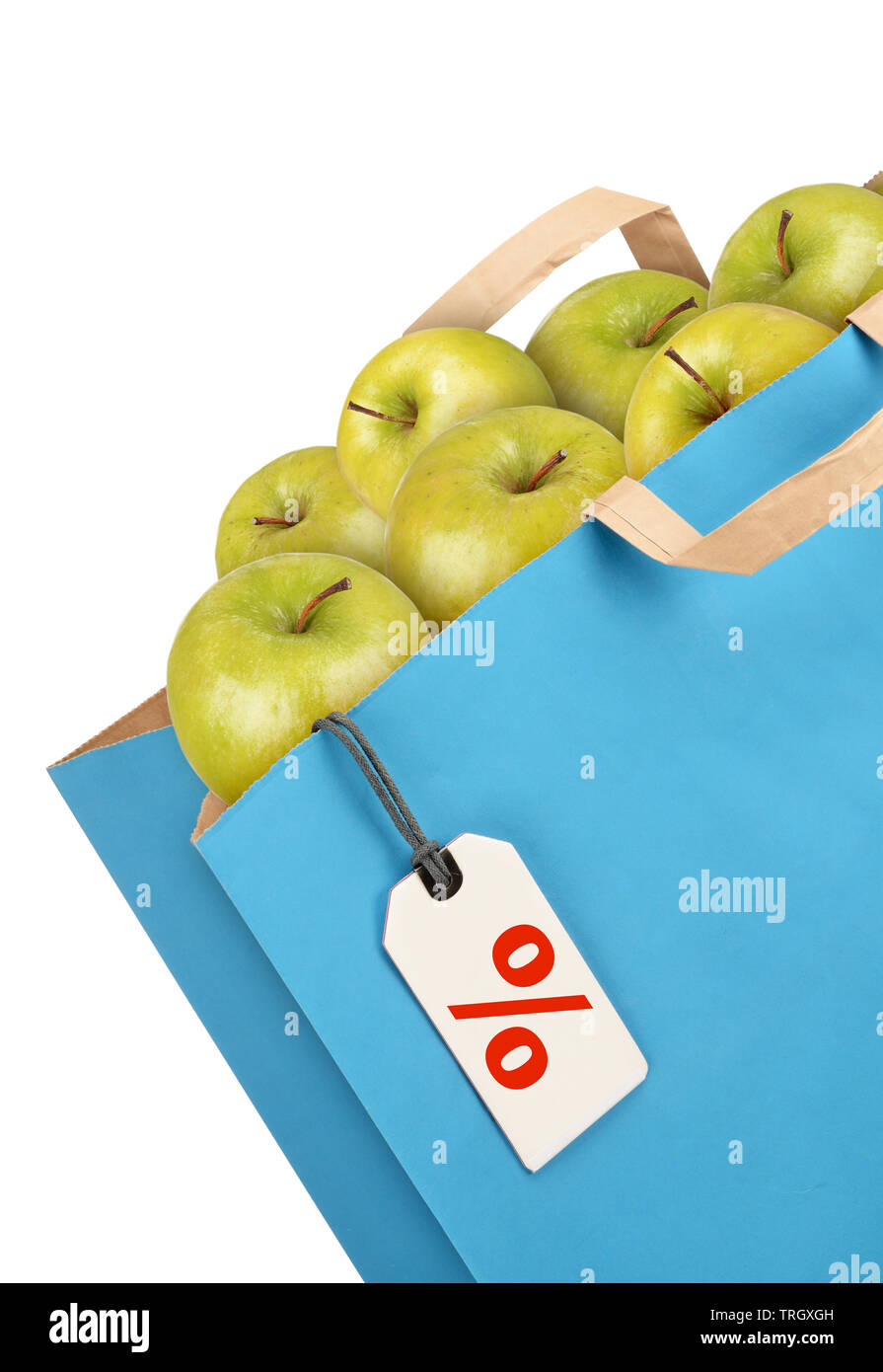 Grocery bag with apples isolated on white background Stock Photo