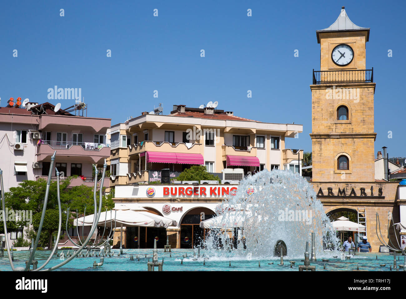 Burger King restaurant and the town clock tower in the Dancing fountains Square, Marmaris, Mugla province, Turkey Stock Photo