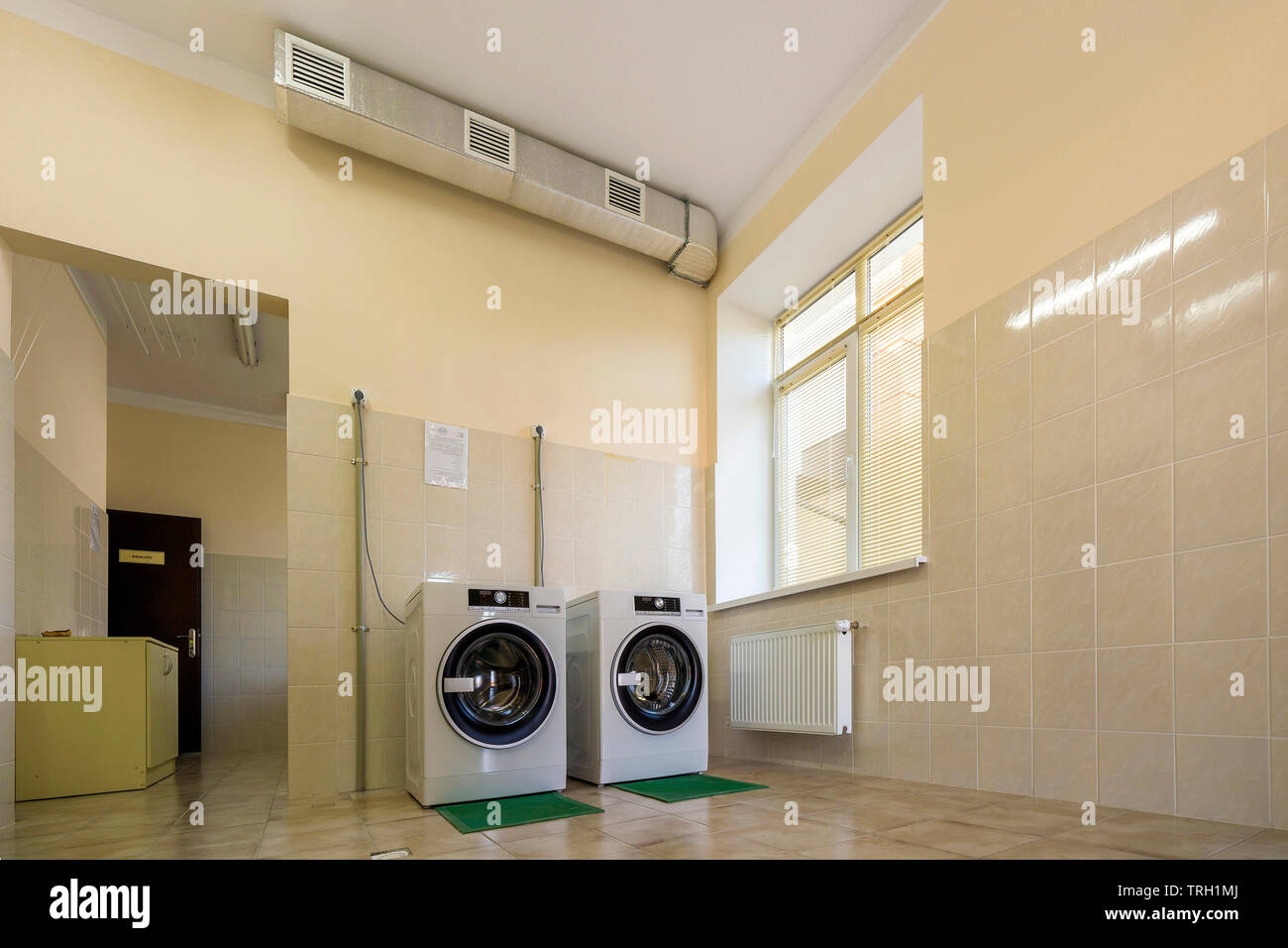 Modern New Industrial Washing Machines On Rubber Insulation