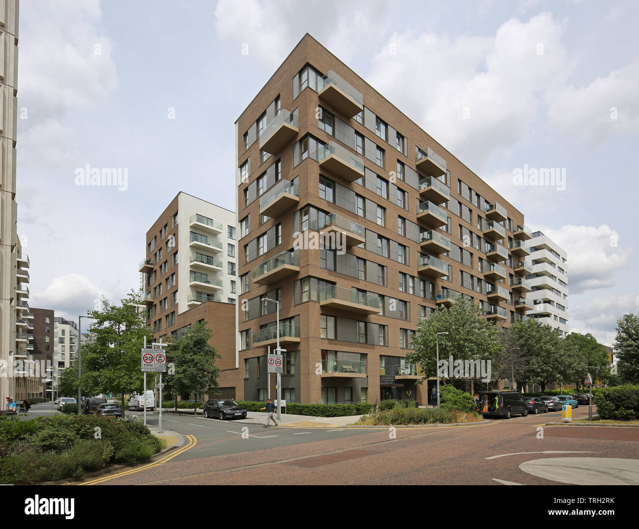 New riverside apartment blocks on London's Greenwich Peninsular: corner of Chandlers Ave and John Harrison Way. By Chinese developer Knight Dragon. Stock Photo