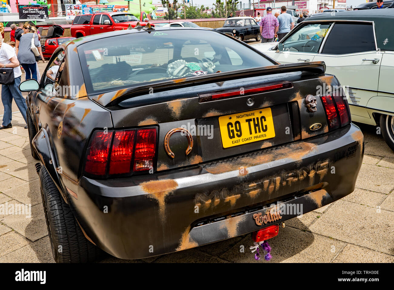 Modified Ford Mustang made to look old and rusty parked up on Great Yarmouth seafront Stock Photo
