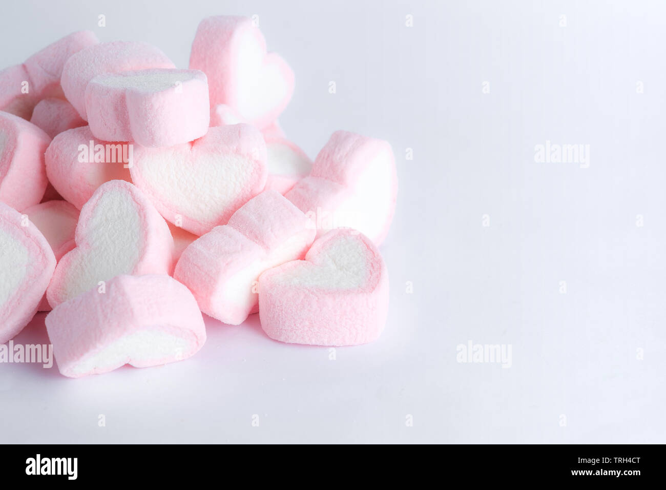 Pink heart shape marshmallow love hi-res stock photography and