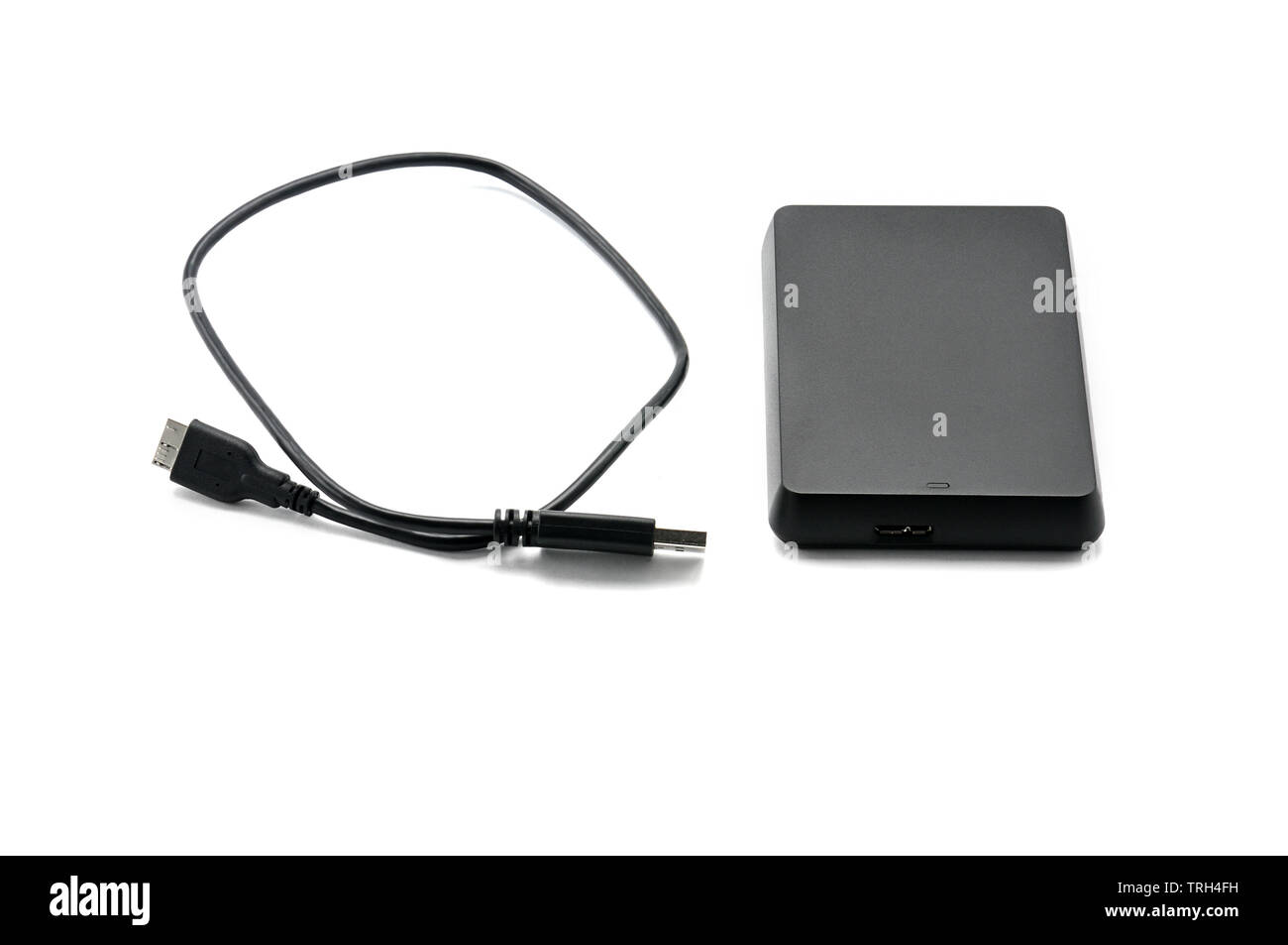 Portable hard drive for backing up various files on an isolated white ...