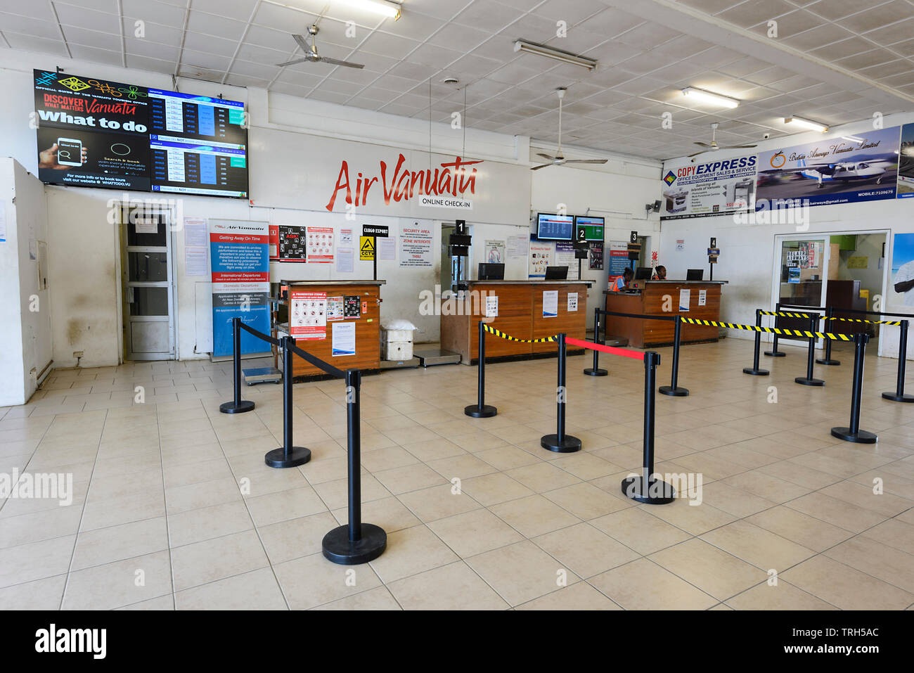 The Air Vanuata check-in desks at Port Vila Airport, Efate Island, Vanuatu Stock Photo