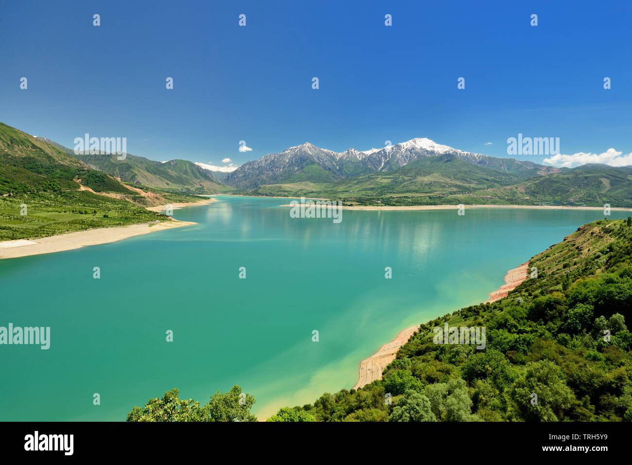 Landscape of the lake and the mountains in Ugam - Chatkal National Park, holiday destination  of hiking and adventure-sport located near the Tashkent, Stock Photo