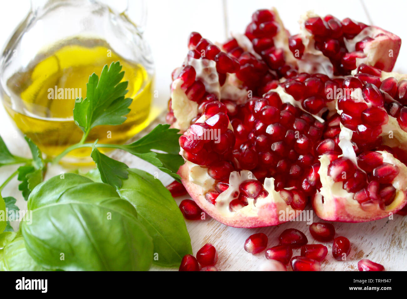 Juicy pomegranate fruit on white background. Top view. Diet food concept. Stock Photo