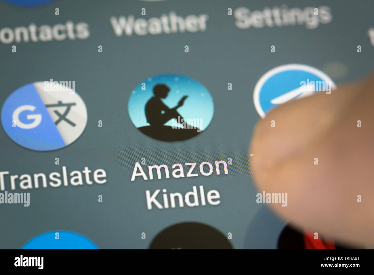 Amazon kindle logo icon on mobile phone screen Stock Photo