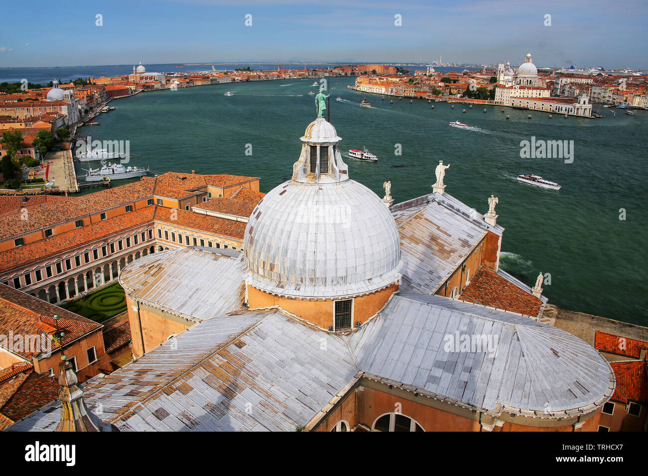 View of the dome of San Giorgio Maggiore church and Giudecca Canal in Venice, Italy. Venice is situated across a group of 117 small islands that are s Stock Photo