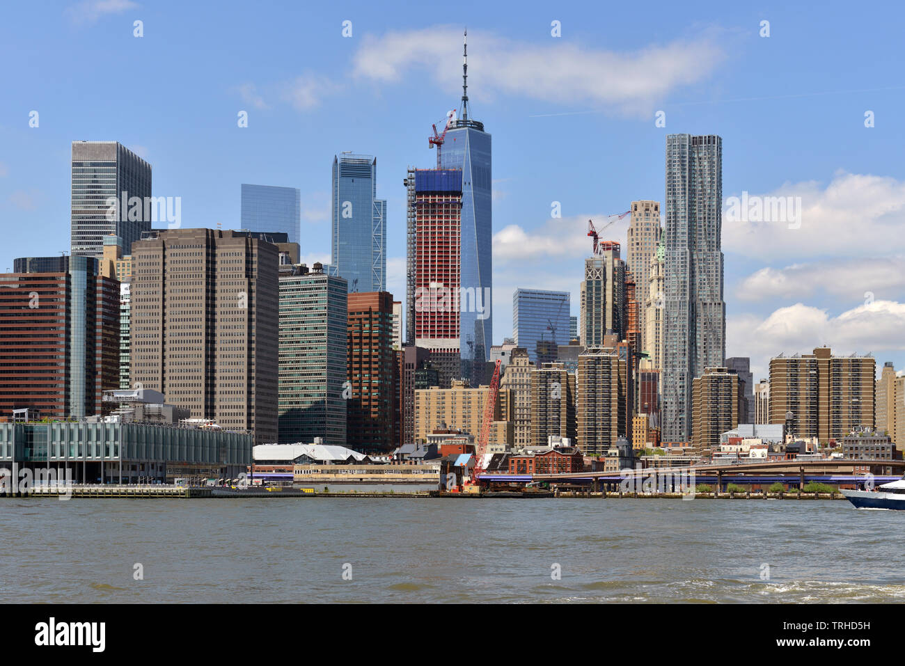 Financial District of Lower Manhattan viewed from Brooklyn Bridge Park Pier. New York City, US Stock Photo