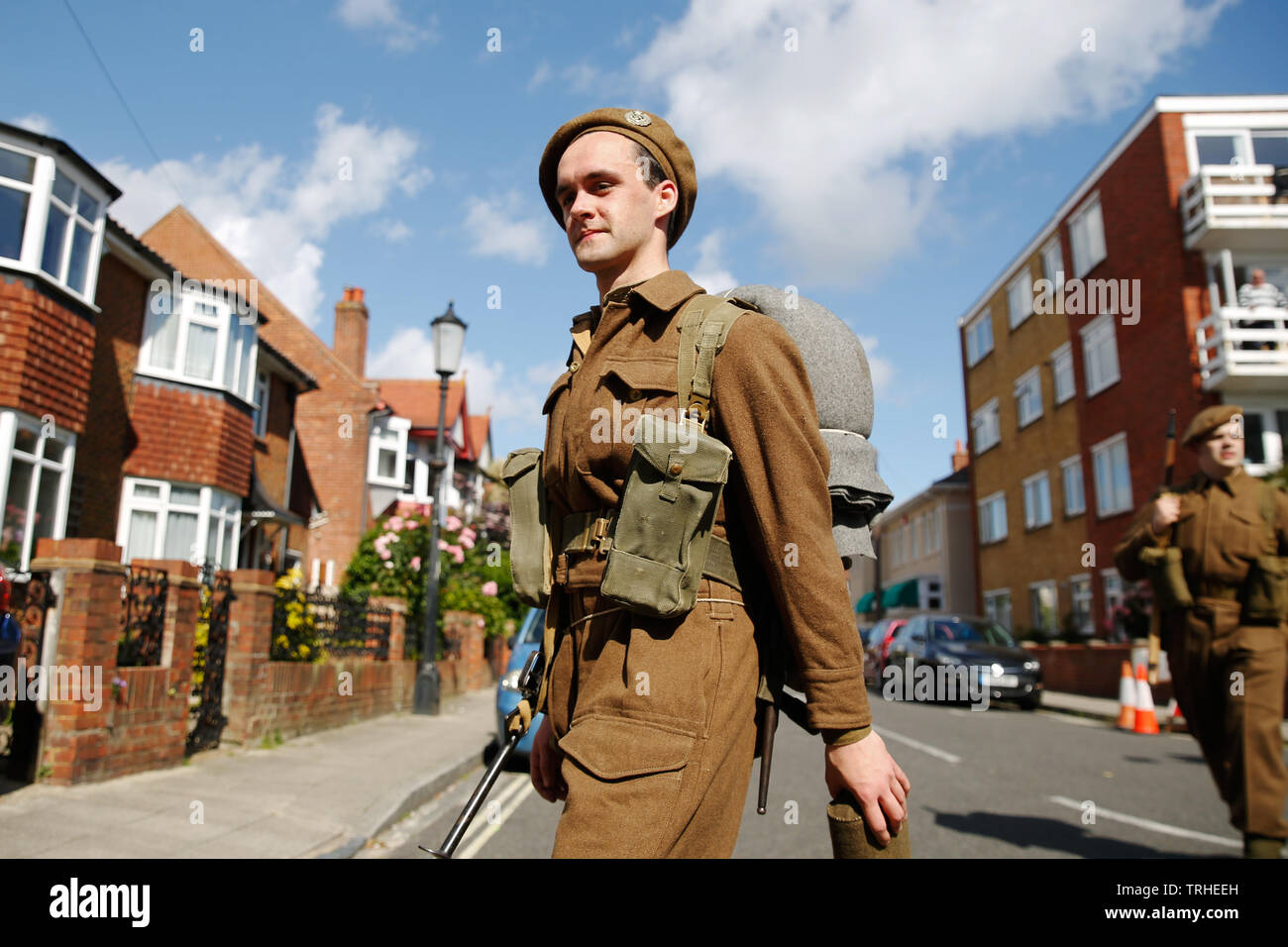 Portsmouth, UK. 6th June, 2019. World War II re-enactors walk the original route of the d-day soldiers took through Portsmouth to the landing craft, in Southsea, Portmsouth Thursday June 6, 2019. D-day commemorations marking the 75th anniversary of the d-day landings Photograph : Credit: Luke MacGregor/Alamy Live News Stock Photo
