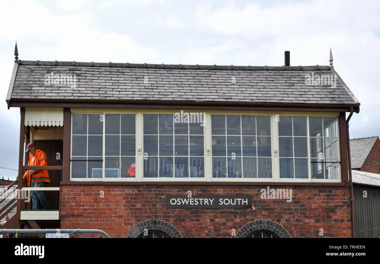 Signal box at Cambrian Heritage Railways in Oswestry showing engineer on doorstep Stock Photo