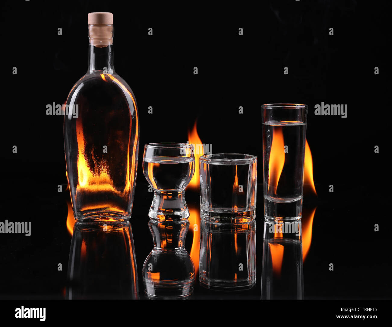 Stack of tequila on fire Stock Photo - Alamy
