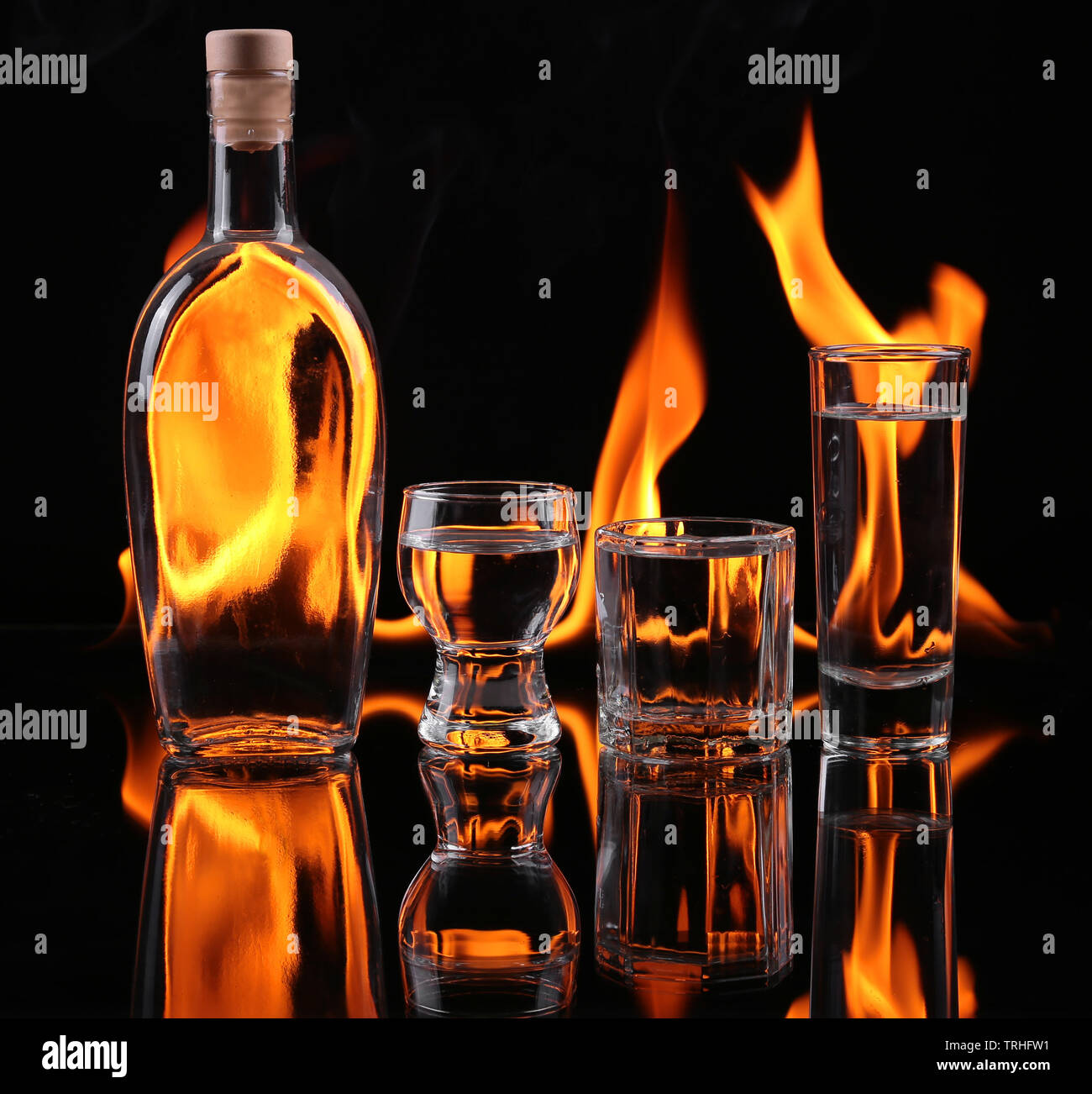 Stack of tequila on fire Stock Photo - Alamy