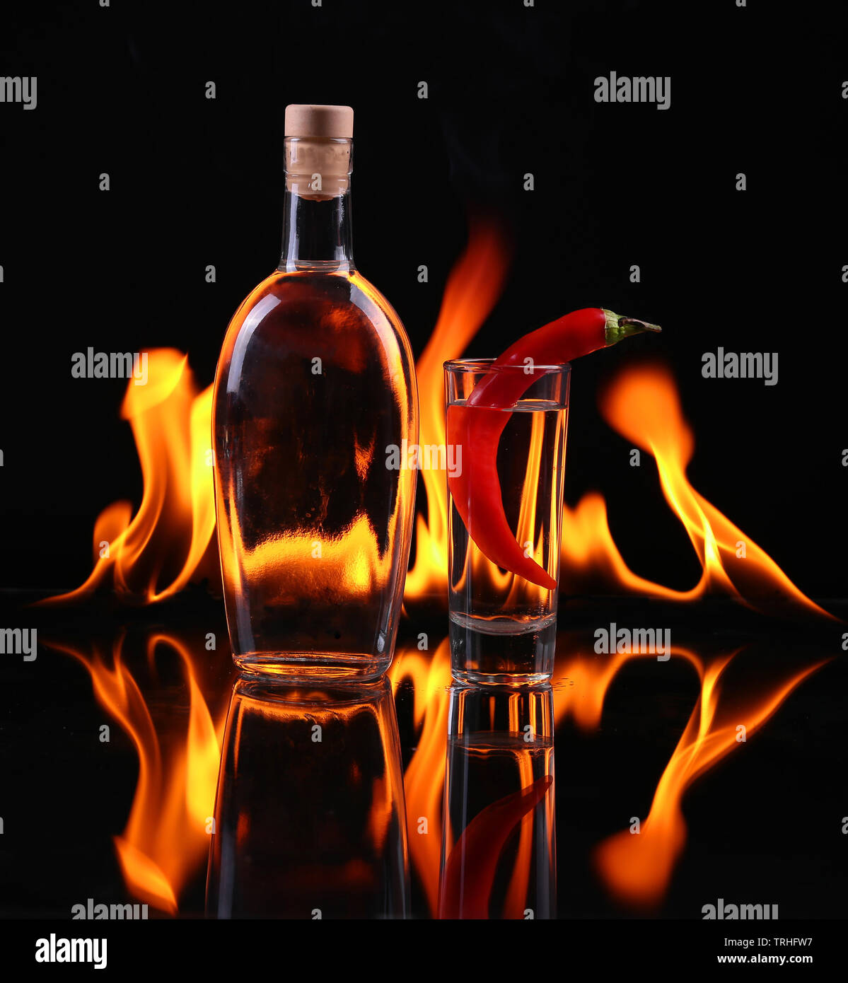 Stack of tequila on fire Stock Photo - Alamy
