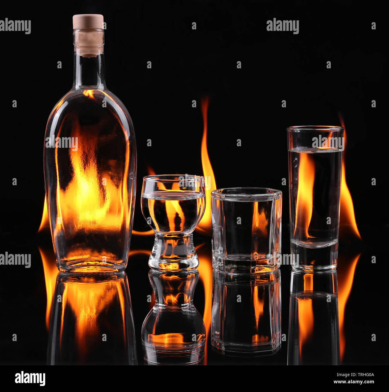 Stack of tequila on fire Stock Photo - Alamy