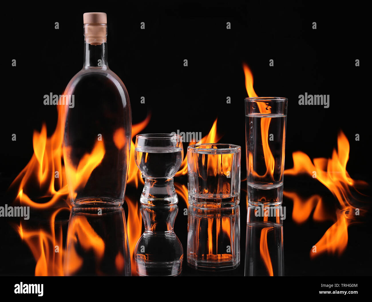 Stack of tequila on fire Stock Photo - Alamy
