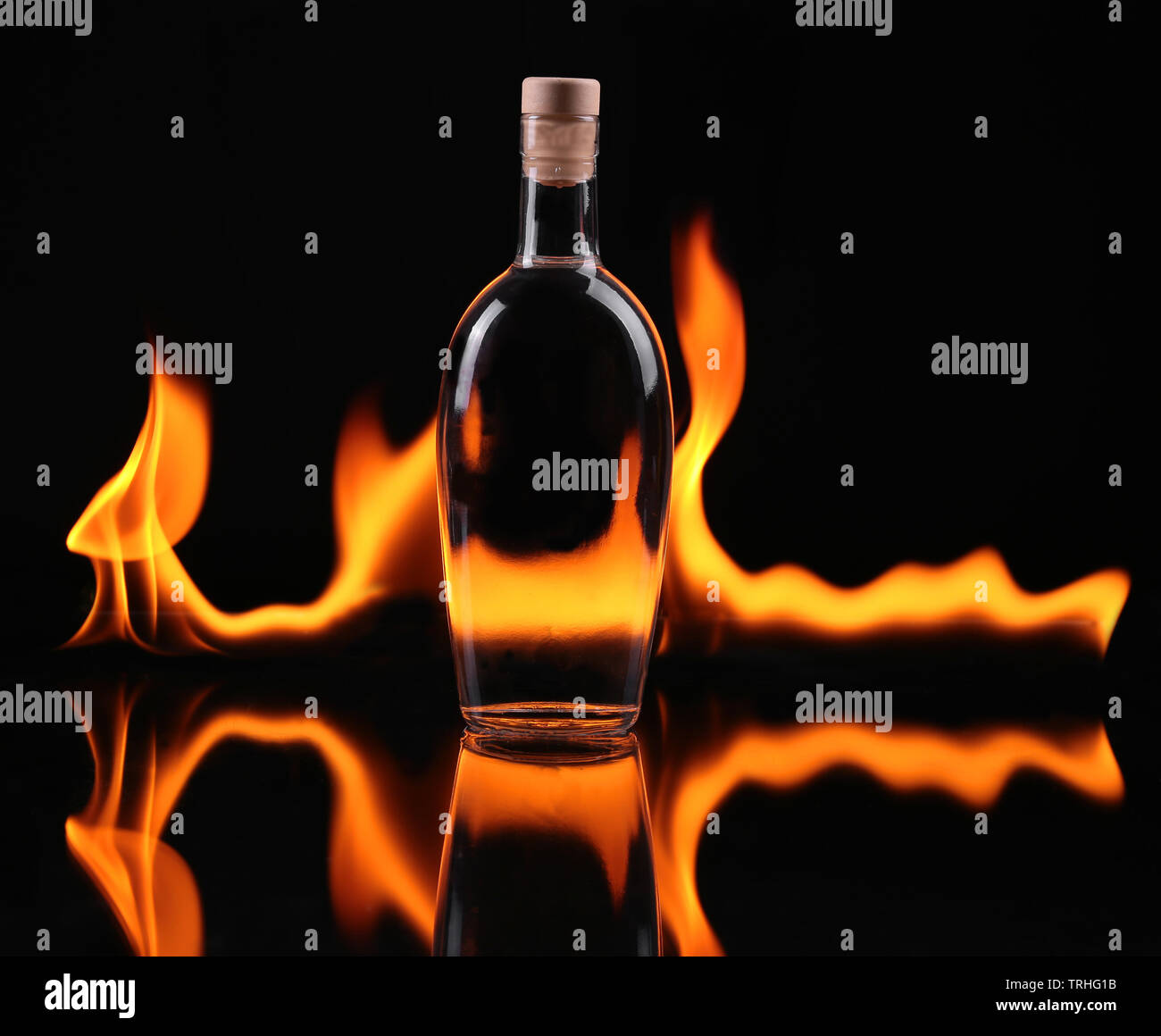 Stack of tequila on fire Stock Photo - Alamy