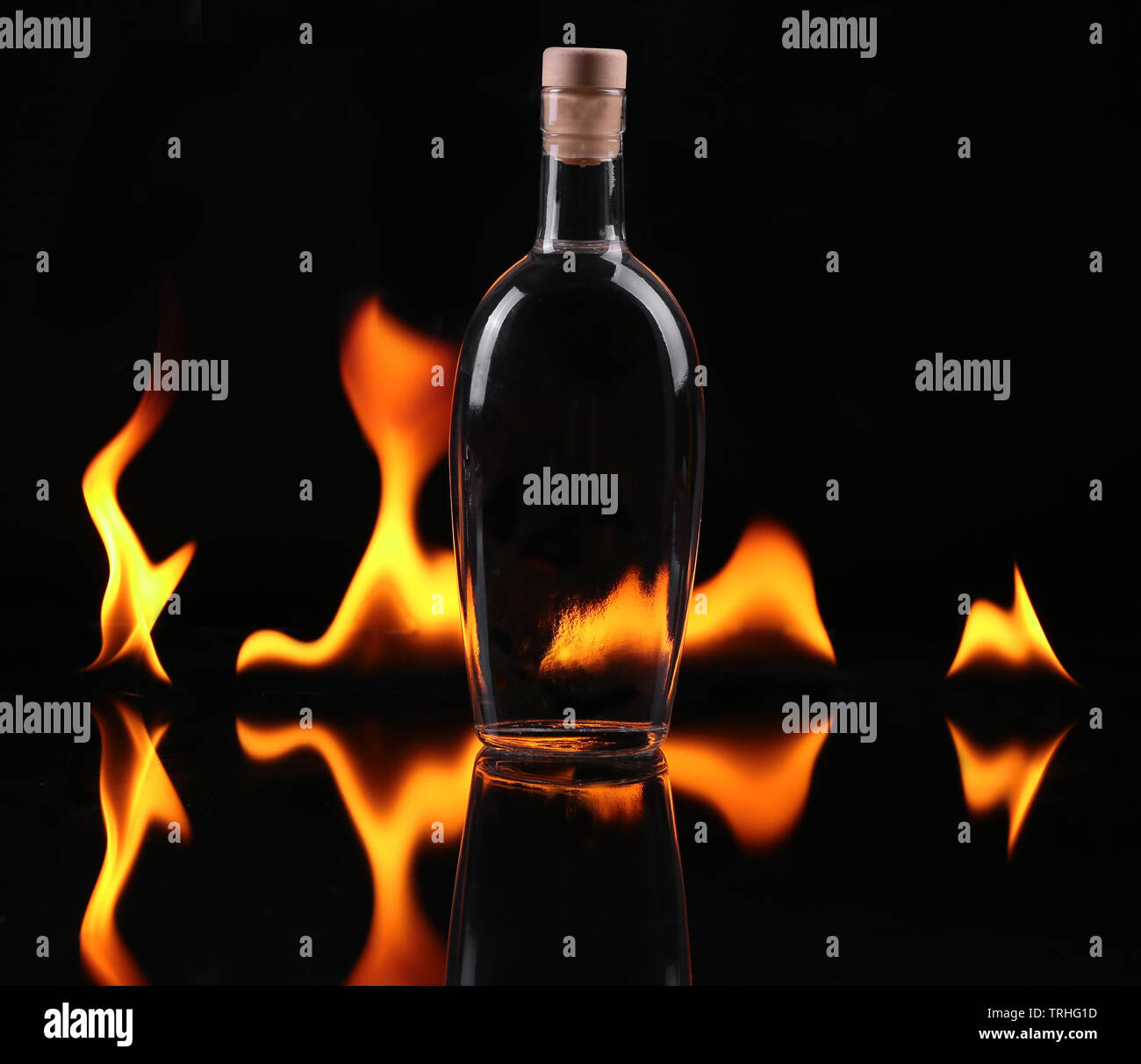 Stack of tequila on fire Stock Photo - Alamy