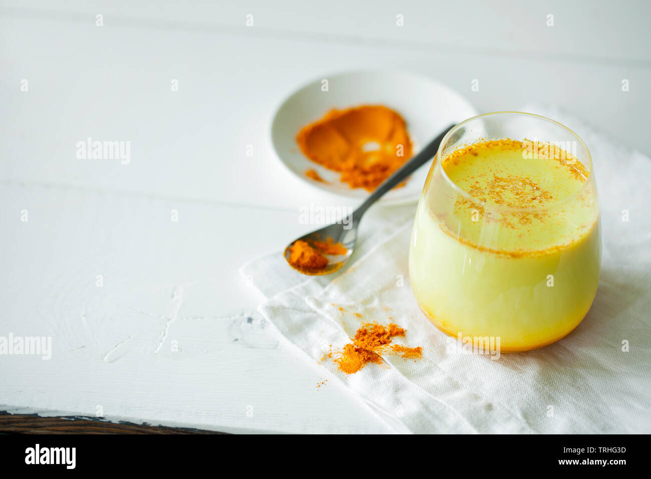 Healthy ayurvedic drink golden almond milk or pumpkin turmeric latte