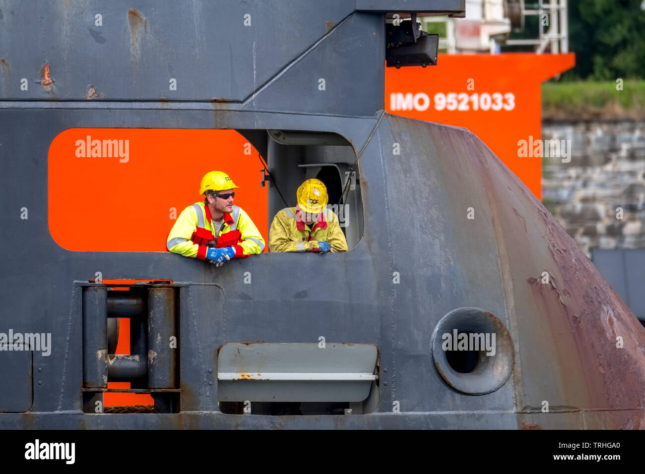 Norwegian sailors on an oil rig. Supply ship with safety helm in Bergen, Hordaland, Norway, Scandinavia, Europe, Bergen, NOR, Travel, Tourism, Travel Stock Photo