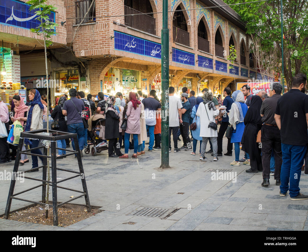 People lining up for lunch at Moslem Restaurant, a popular restaurant in Tehran, Iran. Stock Photo