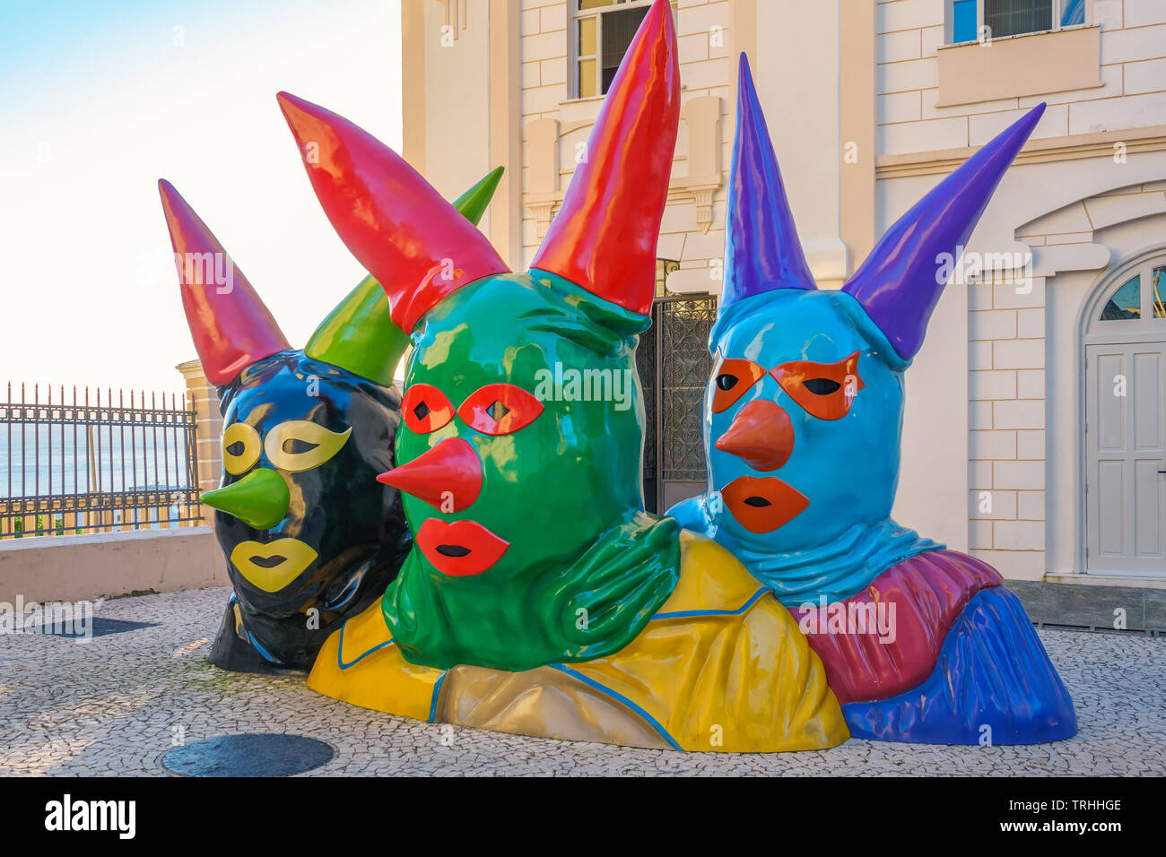 Masked carnival figure sculptures in front of the Casa do Carnaval (House of Carnival) in old town Salvador Bahia Brazil Stock Photo