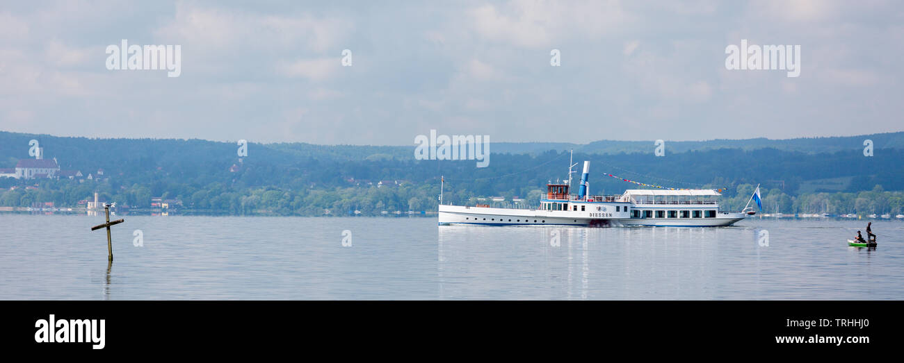 Panorama of paddle steamer 'Diessen' cruising on Lake Ammersee (near Munich). It commutes between towns along the lake. Scenic, beautiful landscape Stock Photo