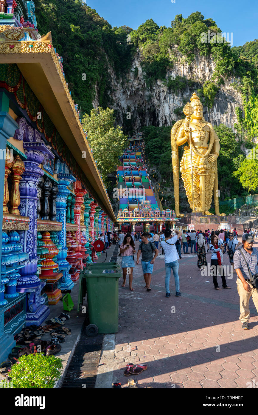 Malaysia, Batu Caves 1st May 2019 - Portrait view of Hindu temple with Lord Murugan Statue & 272 steps rainbow stairs Stock Photo