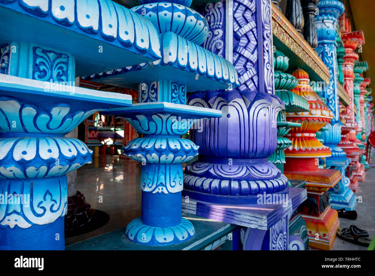 Batu Caves hindu temple with close up view of mysterious colorful pillars architecture design Stock Photo