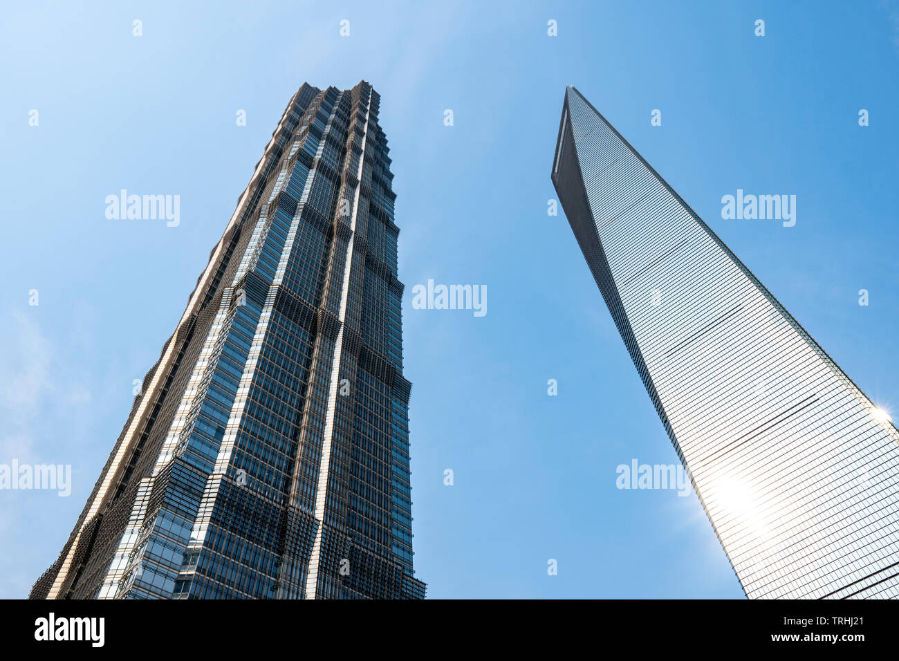 Shanghai, CHINA, 8th May 2019:Low angle view of Shanghai tower & Shanghai World Financial Center with sunny blue sky Stock Photo