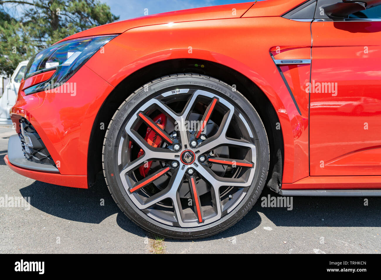 Wattrelos,FRANCE-June 02,2019: red Renault Megane IV RS,view of car wheel,car exhibited at the Renault Wattrelos Martinoire parking lot. Stock Photo