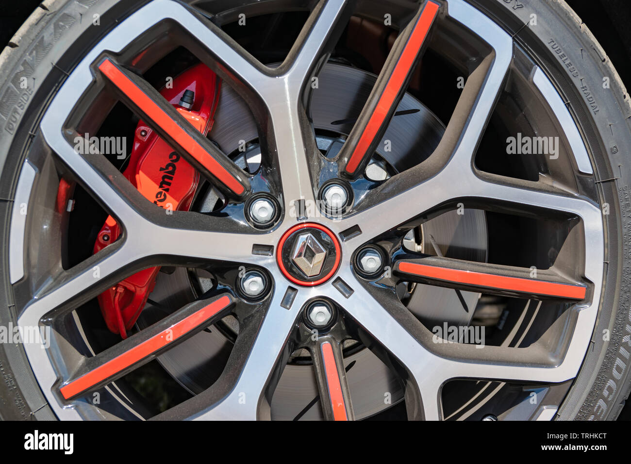Wattrelos,FRANCE-June 02,2019: red Renault Megane IV RS,view of car wheel,car exhibited at the Renault Wattrelos Martinoire parking lot. Stock Photo