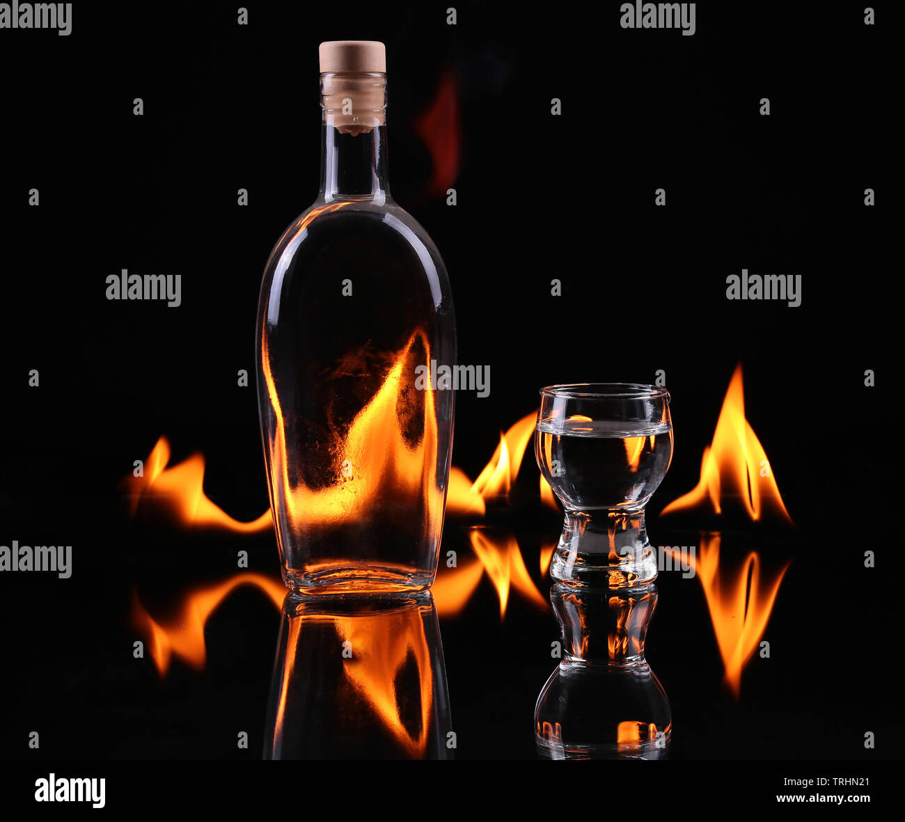 Stack of tequila on fire Stock Photo - Alamy